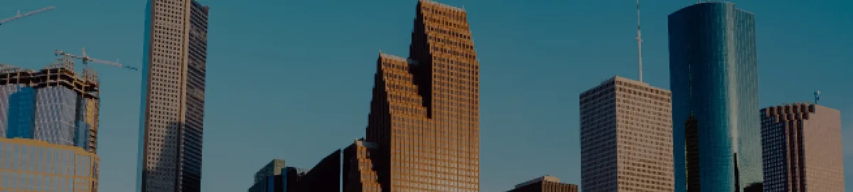 The downtown Houston skyline against a clear blue sky